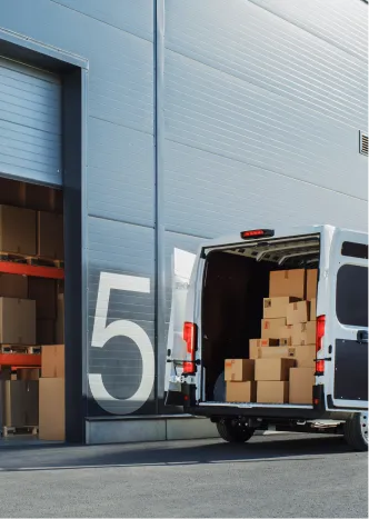 A flooring material delivery van loaded with supplies.